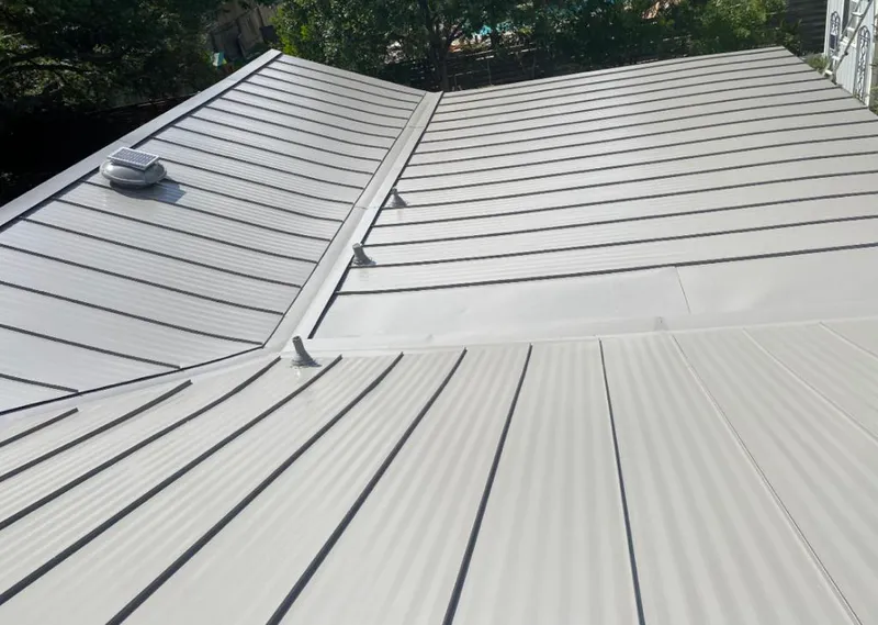 Solar attic fan installed on a metal roof for Roof Ventilation in Arroyo Grande